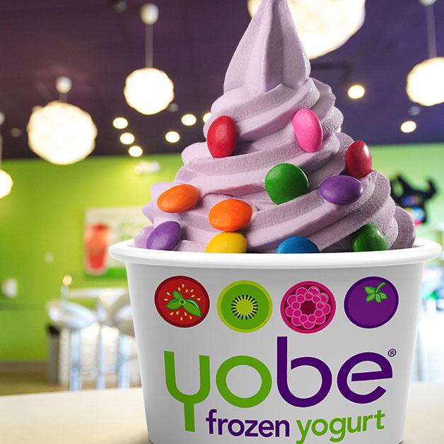 Graphic design of a Yobe cup photoshopped into a background of the store.